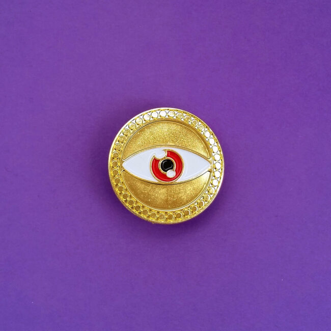 Doctor Strange Eye of Agamotto pin on purple background