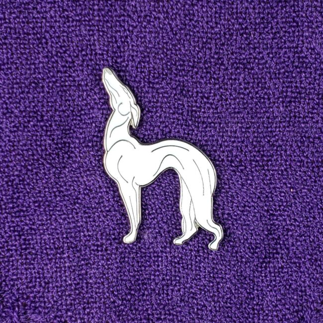 Friends Pat the Dog Pin on purple fabric background